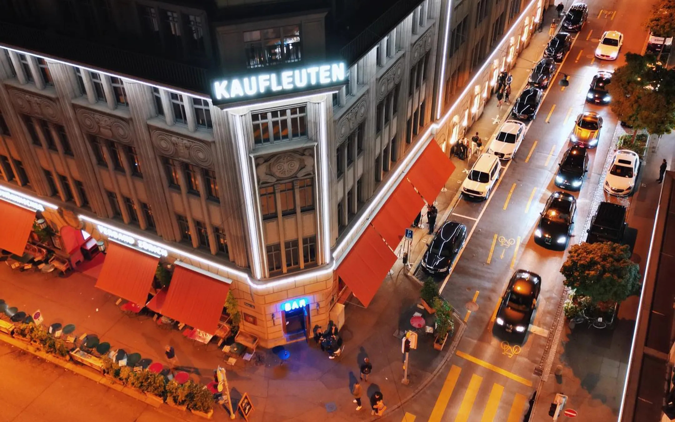 Kaufleuten building from the air at night